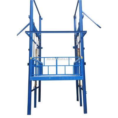 China JUXIN Hotels Warehouse Elevator Four Post Industrial Platform Hydraulic Vertical Cargo Lift for sale