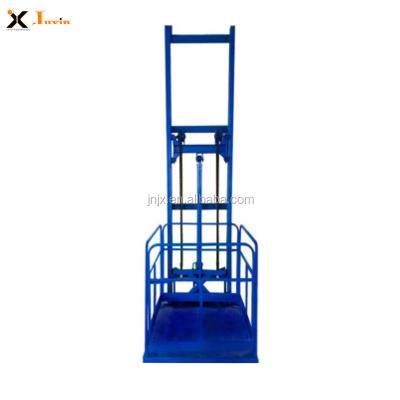 China Hotels JUXIN Small Industrial Warehouse Hydraulic Wall Mounted Elevator Platform for sale