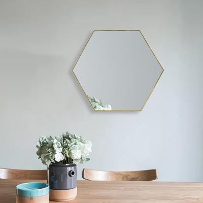 China Home Decor Hexagon Wall Mirror Fashion Style Nordic Modern Easy To Clean Wall Mounted Frame Mirror for sale