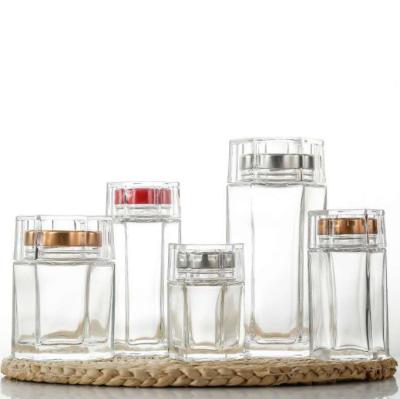 China Wholesale Clear Custom Food Logo Hexagon Glass Honey Storage Jar with Metal Lid and Acrylic Cover for sale