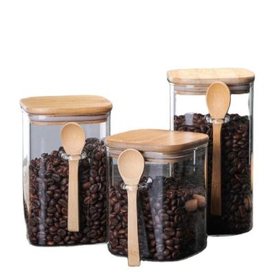 China Food Most Popular Square Containers Spice Food Storage Glass Jar With Lid And Bamboo Spoon for sale