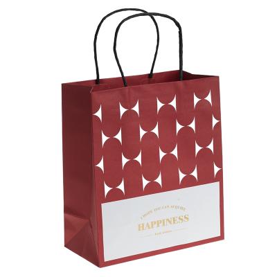 China Soft-loop printing custom retail paper bag luxury paper gift bag paper handle bags for sale