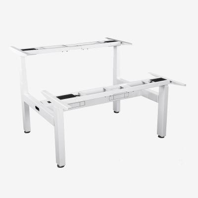 China Electric Adjustable Ergonomic Desk Four Legs Face To Face (Height) Adjustable Desk Sit And Position Up Desk Frame for sale