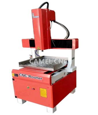 China small size 4 axis graphite cutting carving cnc machine with rotary 6060 for sale