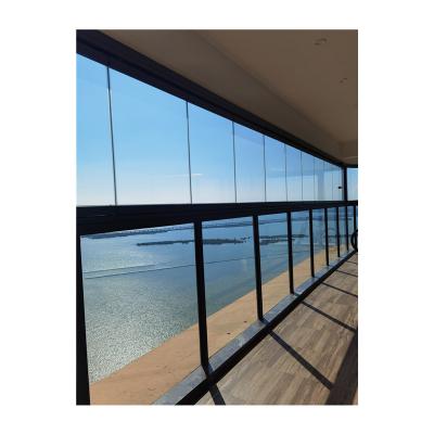 China New Design Waterproof Scandinavian Balcony Transparent Sliding Glazing System Frameless Folding Glass Doors for sale