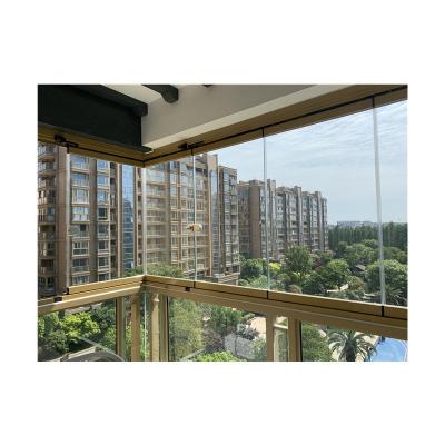 China Waterproof Minimalist Panoramic Transparent Sliding Terrace Folding Frameless Glass Doors for sale