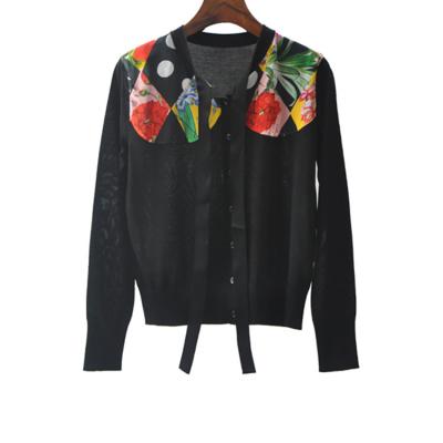 China New autumn and winter French black lazy neckline breathable floral stitching tie knitted short cardigan women's early autumn for sale