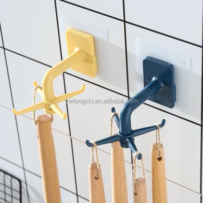 China 2021 Viable Rotating Kitchen Utensil Storage Hook Plastics For Hanging Wall Mountain Universal Adhesive Utensil Holder for sale