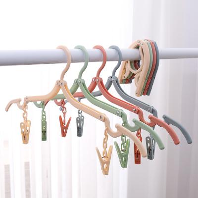 China Travel Sustainable Hangers Portable Folding Hangers Travel Accessories Foldable Clothes Drying Rack For Travel for sale