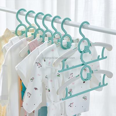 China 2021 Amazon Hot Sale Cartoon Kids Organizer Plastic Telescopic Cloth Drying Rack Hangers Magic ECO-Friendly Material Hanger For Kids for sale