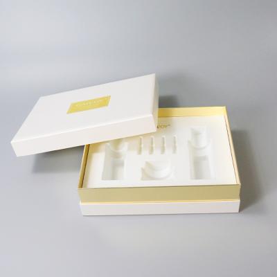 China Handmade White Gold Foil Canton Factory Hot Stamping Polypeptide Mending Nourishing Set For Skin Charming Paper Packaging Boxes for sale