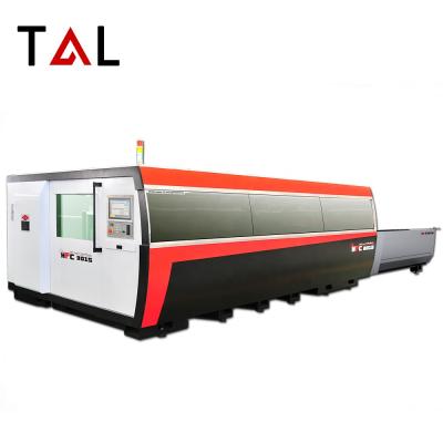 China T&L brand interchange tabletop fiber laser automated loading cutting machine 8kw 10kw IPG Raycus for sale