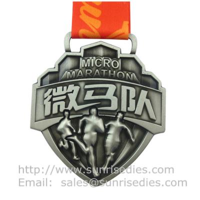 China Embossed 3D event medal with ribbon, designer 3D metal medal with embossed figure for sale