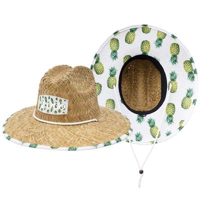 China Wholesale Eco-Friendly Natural Straw Lifeguard Hats Ceapeu Mens Cowboy Straw Hat Summer Sun Beach Grass Pineapple Print For Women for sale