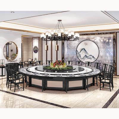 China Modern High End Round Auto Rotating Real Marble Dining Table Set Electric Remote Control Rotator Black Solid Wood Table Top for sale