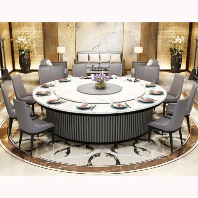 China Modern Luxury Large Size Round Automatic Rotary Real Marble Dining Table Set For Hotel Hall Restaurant Fish Belly White Marble Table for sale