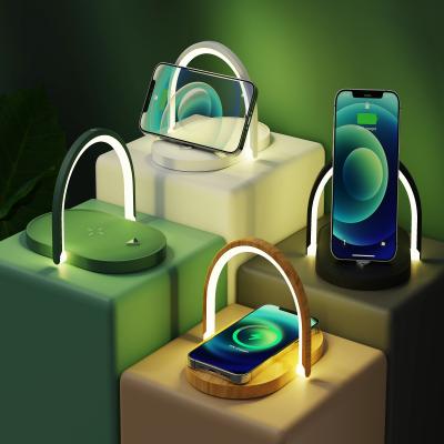 China Charging for Amazon Hot Selling 2022 Phone 15W Wireless Charger with Night Light Foldable Power Bank Phone Holder for sale