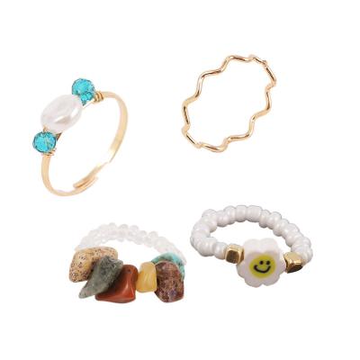 China Ladies Ring Bohemian Woven Gravel Smiley Ring Set Exaggerated Personality Crystal Ring Jewelry from European and American Statistical Institute for sale