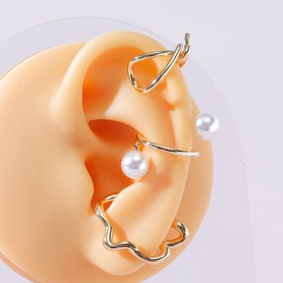 China Natural environmental protection Qingdao Daiwei Europe and America fashion jewelry unilateral ear clip exaggerated asymmetrical girls' earrings for sale