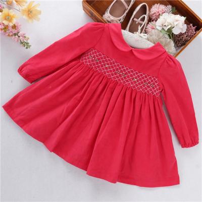 China Winter Corduroy Kids Girl Clothing Breathable Embroidery Smocked Floral Kids Dresses Red Floral C20729 for sale