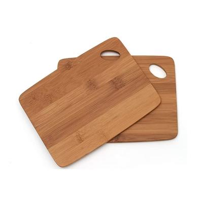 China Sustainable Bamboo Wood Thin Kitchen Cutting Board With Oval Hole In Corner for sale