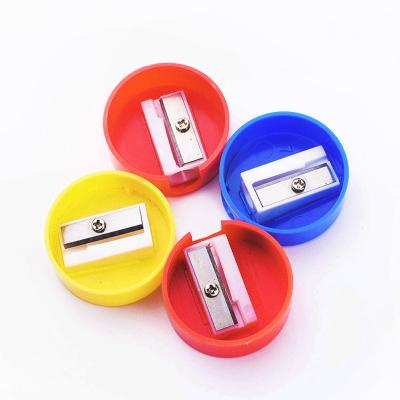 China Logo Printing Easy Plastic Round Looking Orange Single Hole Black Cheap Mini Manual Pencil Sharpener for sale