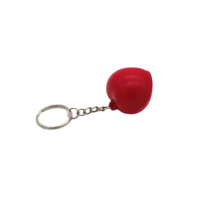 China Anti-stress custom logo anti-stress pu mini mini stress red heart key chain foam trigger ball for sale