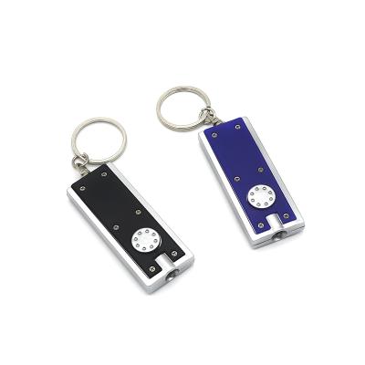 China Promotional Light Custom Logo LED Key Chain PVC Mini Plastic Cheap Led Key Chain Flashing Flashlight for sale