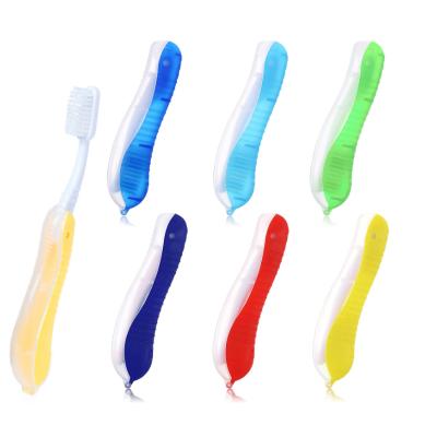 China Foldable PP Plastic Portable Travel Folding Soft Toothbrush With Translucent Hood for sale