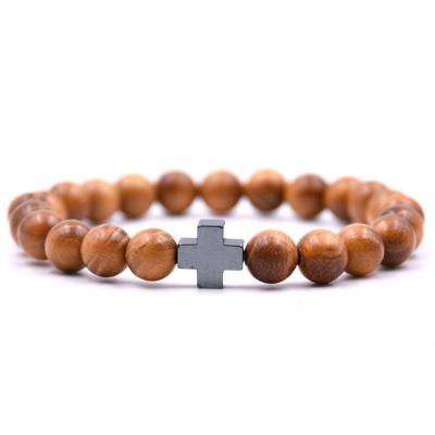 China Classic Fatima Hand Cross Charm Bracelet Wood Classic New Design Products Beads Bracelet For Men for sale