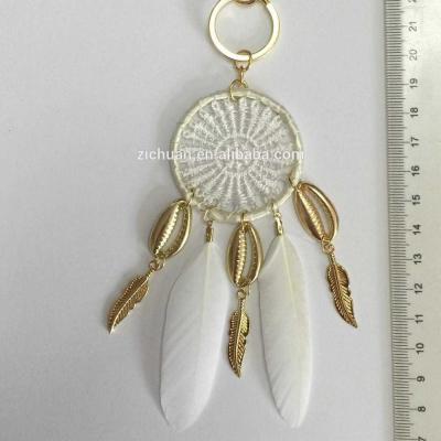 China High Quality Feather Macrame Bag Charm Feather Tassel Macrame Bag Chain Key Charm for sale