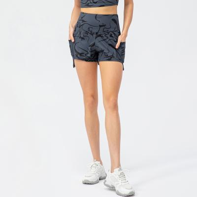 China 2022 New Arrival Nake Breathable Women Feeling Loose Fit High Waist Sports Workout Print Shorts With Side Pocket for sale