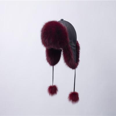 China Wholesale cheap fluffy brown fluffy brown raccoon hat real fox fur trapper hat ladies custom double pom for sale