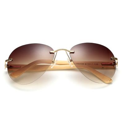 China Fashion Sunglasses 2021 Rimless Wood Lens UV400 1502 Driver Frame Natural Wooden Women Men Sunglasses for sale