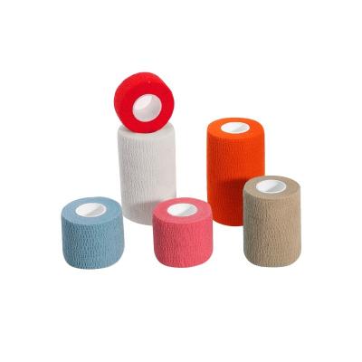 China 60%Nonwoven+35%Glue+5% Spandex Cotton Sports Tape Cohesive Elastic Bandage for sale