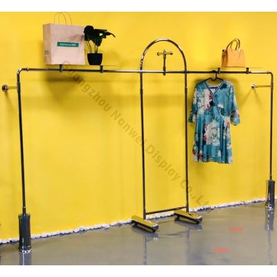 China One-stop design wall floor rack display rack clothing store clothing display rack special household metal new for sale