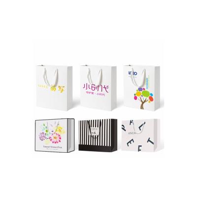 China Custom Recycled Materials LOGO Fashion Brand Clothing Mall Clothing Store Packaging Bag Environmental Protection Recyclable Paper Bag for sale