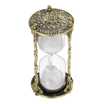 China Magical Contemporary Hot Sale Time Hourglass Decoration Ornaments Creative Metal Hourglass Sand Timer For Home Decor Gift for sale