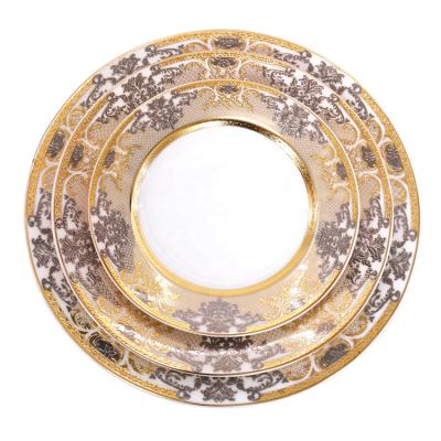 China Viable New Design High Quality Gold Restaurant Tableware Wedding Ceramic Dinner Charger Dishes Gift Set for sale