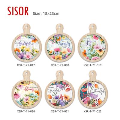 China Sustainable Wholesale Sublimation Ceramic Pad Flower Design Ceramic Trivet with Handle Custom Cork Base Ceramic Cooking Tile Pacemat for sale