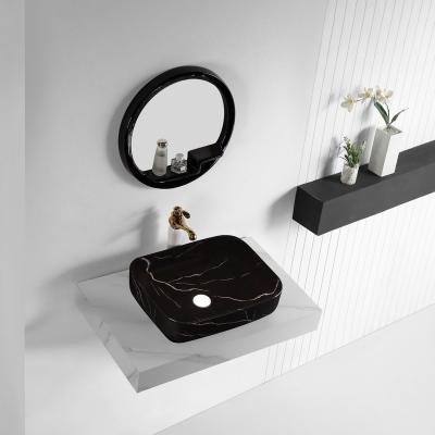 China Modern Design Hotel Sink Porcelain Counter Top Art Basin Vessel Sink Counter Top Basin With Round Mirror for sale