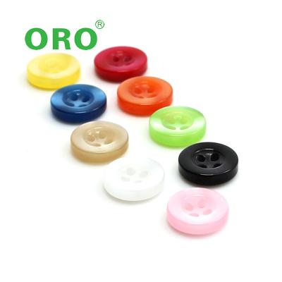 China Resin Nickel Free Colored Wide Round Button Plastic Edge 4-Holes Button for sale