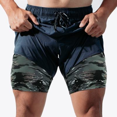 China QUICK DRY OEM Athletic Camo Gym Fit Activewear Running Shorts 2 In 1 Mens Sports Fitness Gym Shorts With Under Lining for sale