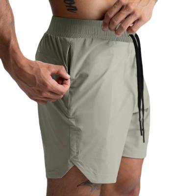 China QUICK DRY Summer Active Wear Quick Dry Fitted Jogging Shorts De Hombre Gym Running Workout Shorts With Zipper Pocket for sale