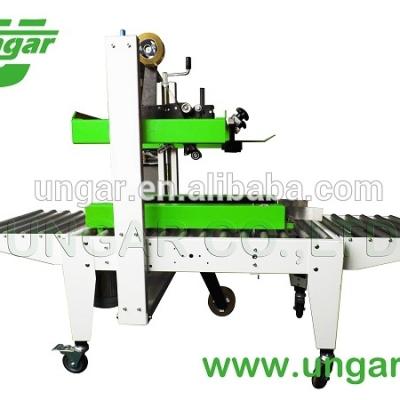 China Electric Automatic Carton Sealer Machine  UNCS-1550 1820*900*1370MM for sale