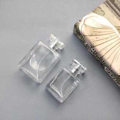 China Cosmetic Factory Wholesale 30ml 50ml Clear Rectangular Square Spray Perfume Glass Bottle With Sprayer for sale