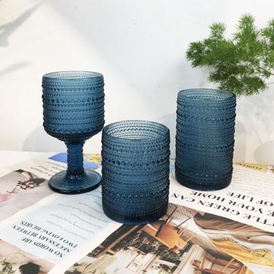 China Europe Wedding Supplies Sky Blue Retro Relief Wine Glass Goblet Glassware Water Colored Embossed European Drinkware Cup for sale