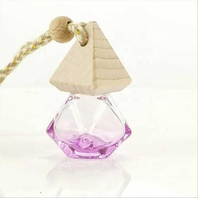 China PERFUME Glass Perfume Bottle With Green Wood Car Lid Pendant Bottles For Diffuser for sale