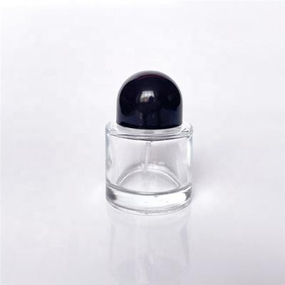 China 30ml Cosmetic Cylinder Essential Oil Round Mist Spray Glass Bottle For Perfume for sale