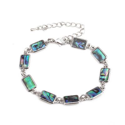 China 2023 Latest Arrival Trendy Luxury Natural Abalone Shell Cross Bracelet Boho Beach Silver Jewelry Natural Color Bracelets For Women Men for sale